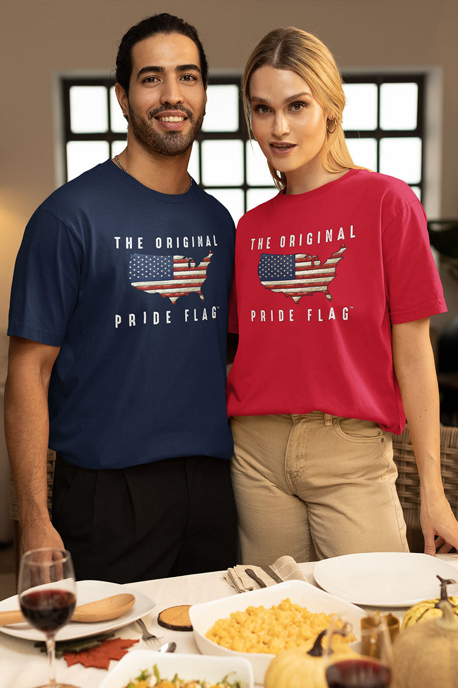 Couple wearing The Original Pride Flag unisex t-shirts