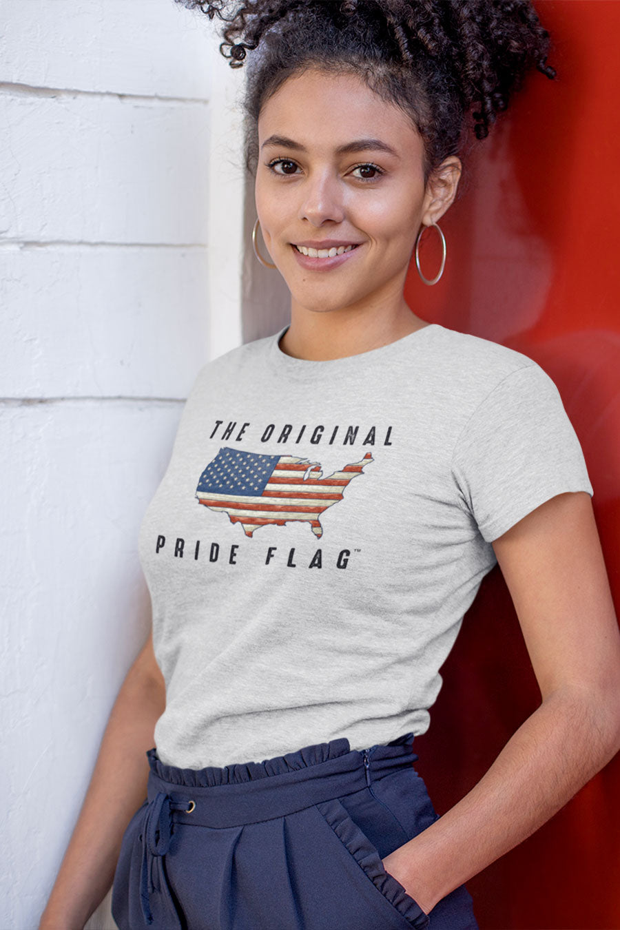 Woman wearing The Original Pride Flag femme t-shirt