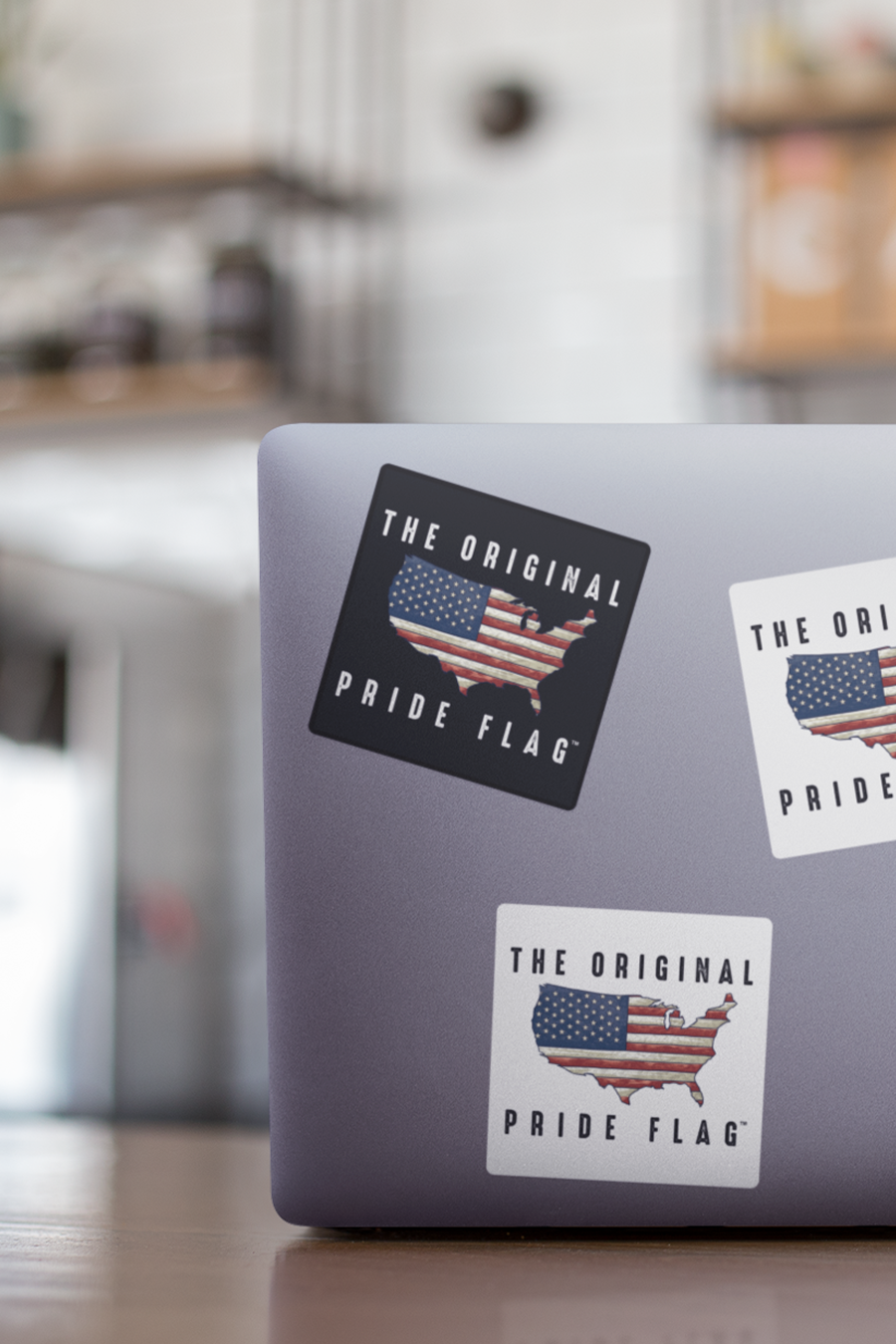 The Original Pride Flag stickers on laptop
