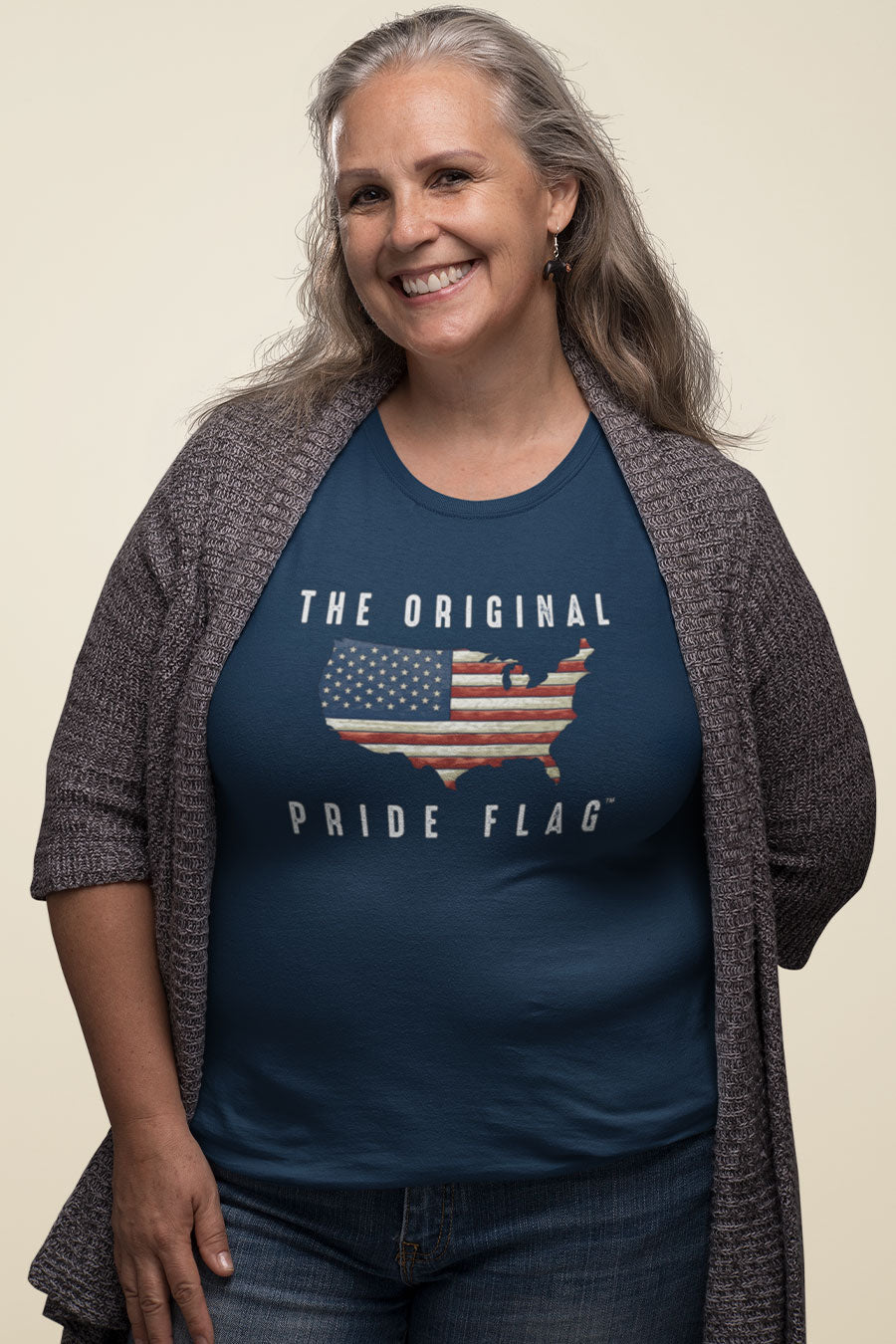 Older woman wearing navy The Original Pride Flag femme t-shirt